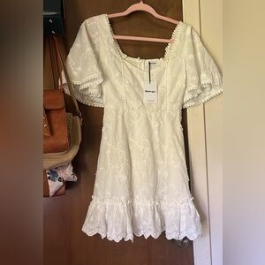 ShowPo. Dress brand new with tags ! Size 2 (fits s)